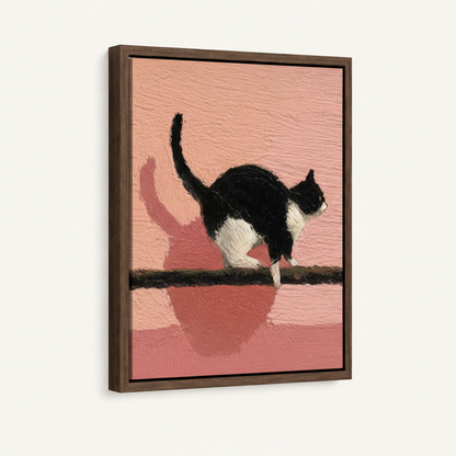 Angled close-up of framed black and white cat canvas in walnut float frame showing oil texture and pink shadow detail