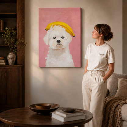 Gallery-wrapped canvas of a white dog against pink beside a woman in a white shirt.