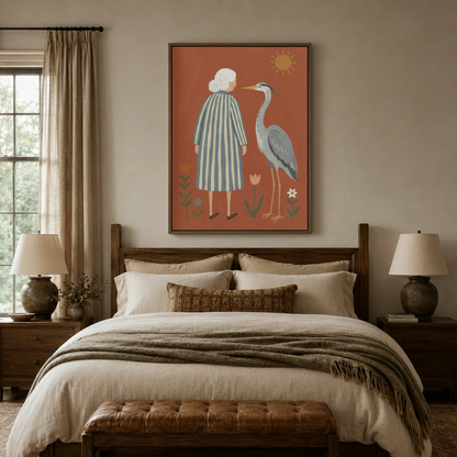 Framed woman and heron folk art canvas centered above bed in warm traditional bedroom