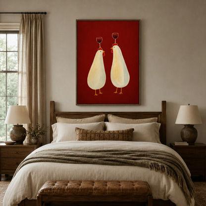 Whimsical chickens balancing red wine glasses canvas art in dark walnut frame above linen bed in cozy bedroom