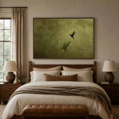 Dark nature hummingbird canvas wall art above bed headboard in cozy warm-toned bedroom