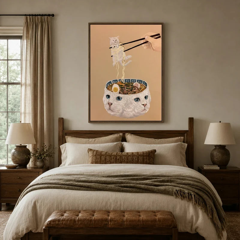Playful cat ramen bowl canvas styled above a bed in a cozy neutral bedroom with warm linen bedding