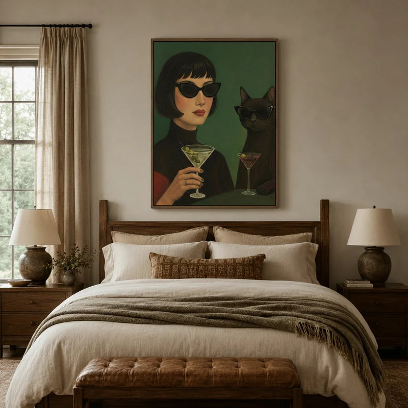 Woman and cat martini canvas wall art above bed in cozy neutral bedroom with warm linen tones