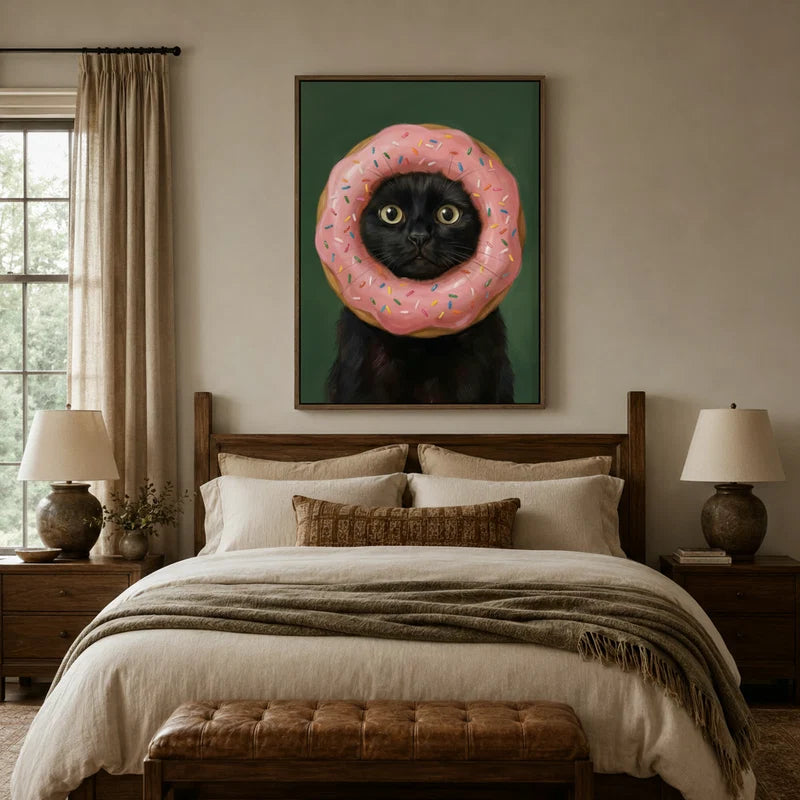 Wide-eyed black cat donut wall art displayed above a bed in a cozy farmhouse-style bedroom