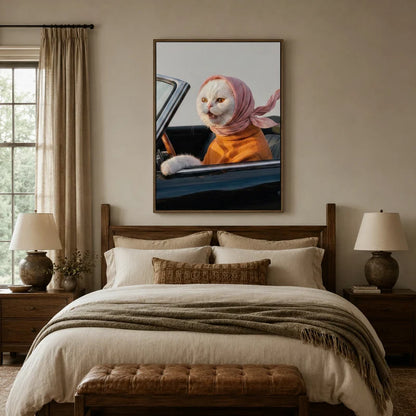 Whimsical white cat driving vintage car canvas art displayed above a bed in a warm farmhouse-style bedroom