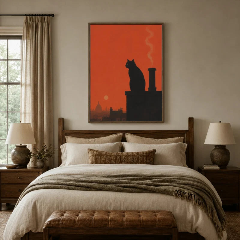 Vintage-style black cat rooftop wall art displayed above a bed in a warm rustic bedroom setting