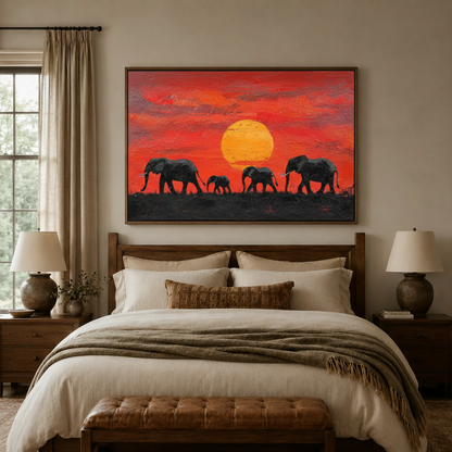 Four elephants at African sunset framed canvas art above bed headboard in cozy neutral bedroom