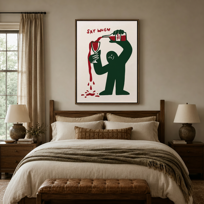 Funny wine pouring wall art in float frame above bed in cozy neutral bedroom