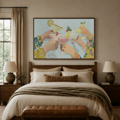 Girls night cocktail toast canvas wall art above a wooden bed headboard in a warm neutral bedroom