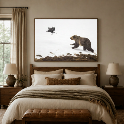 Grizzly bear wildlife photography canvas art above a wooden bed headboard in a rustic bedroom