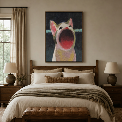 Bold cat expression canvas print in walnut floating frame above linen bed in cozy warm bedroom