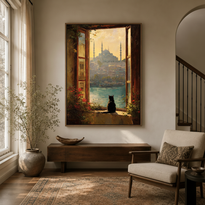 Framed black cat Istanbul canvas print displayed above console table in warm neutral entryway