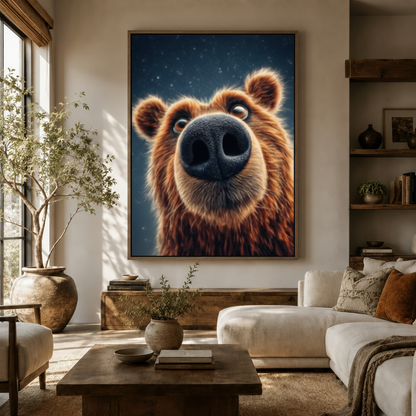 Oversized whimsical bear portrait canvas print displayed above a sofa in a bright boho living room