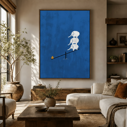 Bold cobalt blue elephant seesaw wall art above sideboard in warm modern living room