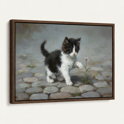 Framed classical realist kitten canvas shown at 3/4 angle with dark walnut floater frame on off-white background