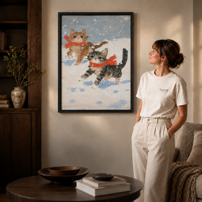 Black framed snow cats wall art in a cozy living room with a woman gazing at falling snow
