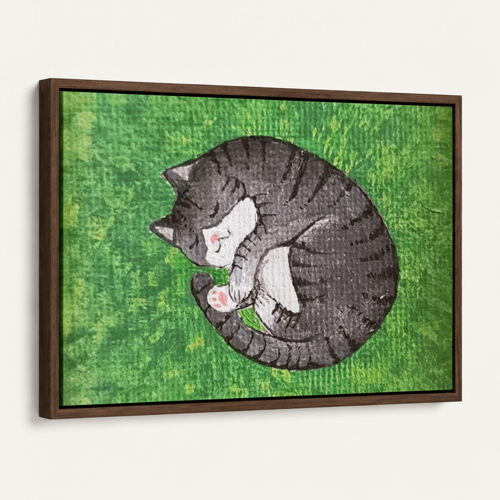 Framed canvas print showing a curled gray cat illustration on a white background