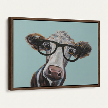 Close view of whimsical cow artwork with black glasses and blue background