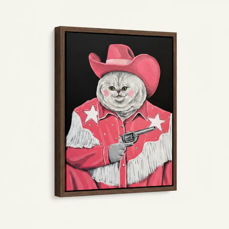 Cowgirl cat in pink hat and fringed shirt canvas in dark walnut floater frame, 3/4 angle view on white background