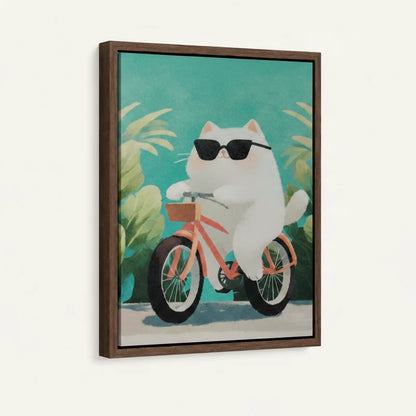 Side-angle view of framed canvas showing cool white cat on pink bike with teal tropical background
