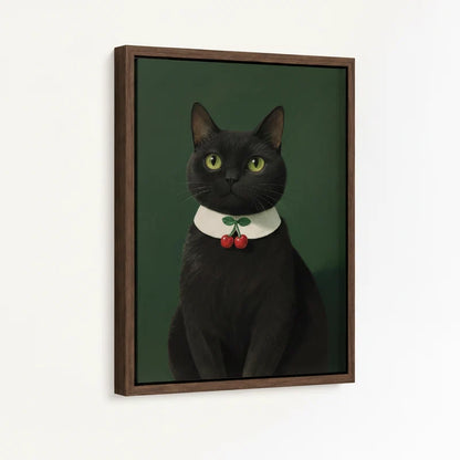 Angled product view of framed canvas — black cat with white collar and red cherry brooch on forest green in walnut float frame
