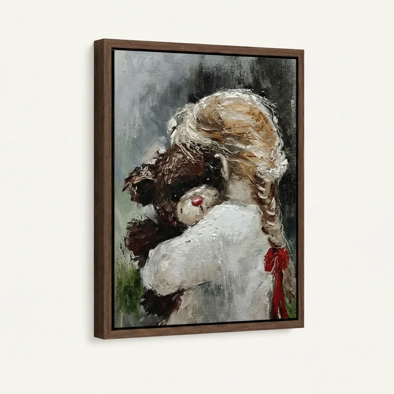 Framed canvas close-up of girl with red ribbon braid tenderly embracing a dark teddy bear