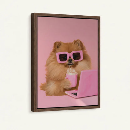 Side-angle view of framed canvas showing fluffy Pomeranian in pink sunglasses holding a pink cup