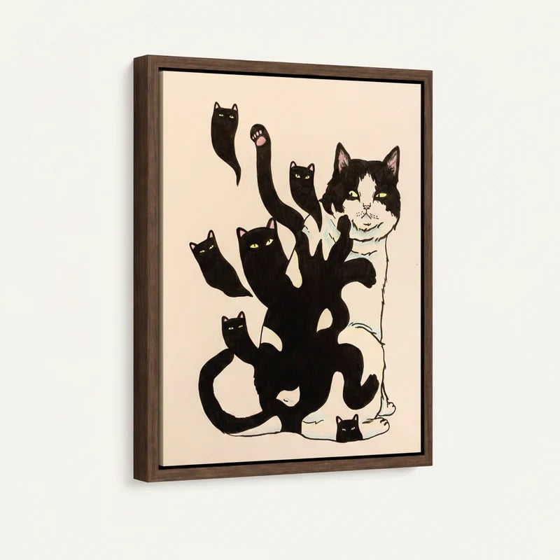 Black and white cat shadow canvas in dark walnut floater frame, 3/4 angle view on cream background