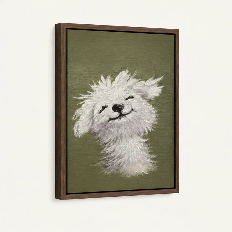 Angled product view of framed canvas — happy white fluffy dog with eyes closed on sage green in walnut float frame