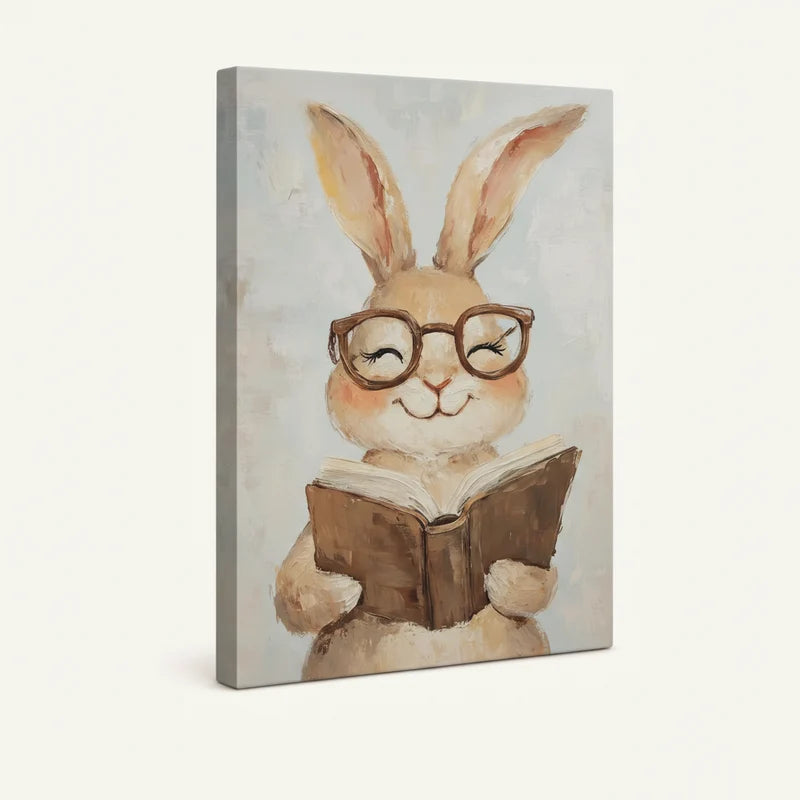 Gallery-wrapped smiling bunny with glasses reading book canvas print on neutral background