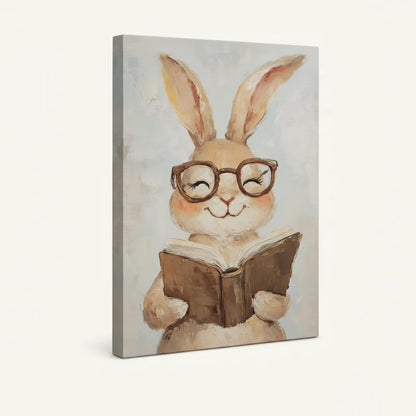 Gallery-wrapped smiling bunny with glasses reading book canvas print on neutral background