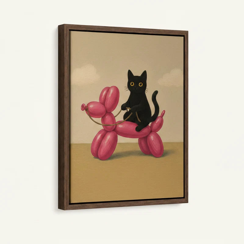 Close-up of framed black cat balloon dog canvas art with walnut floater frame detail