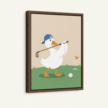 Framed canvas close-up of chubby white duck in blue cap swinging golf club on green fairway