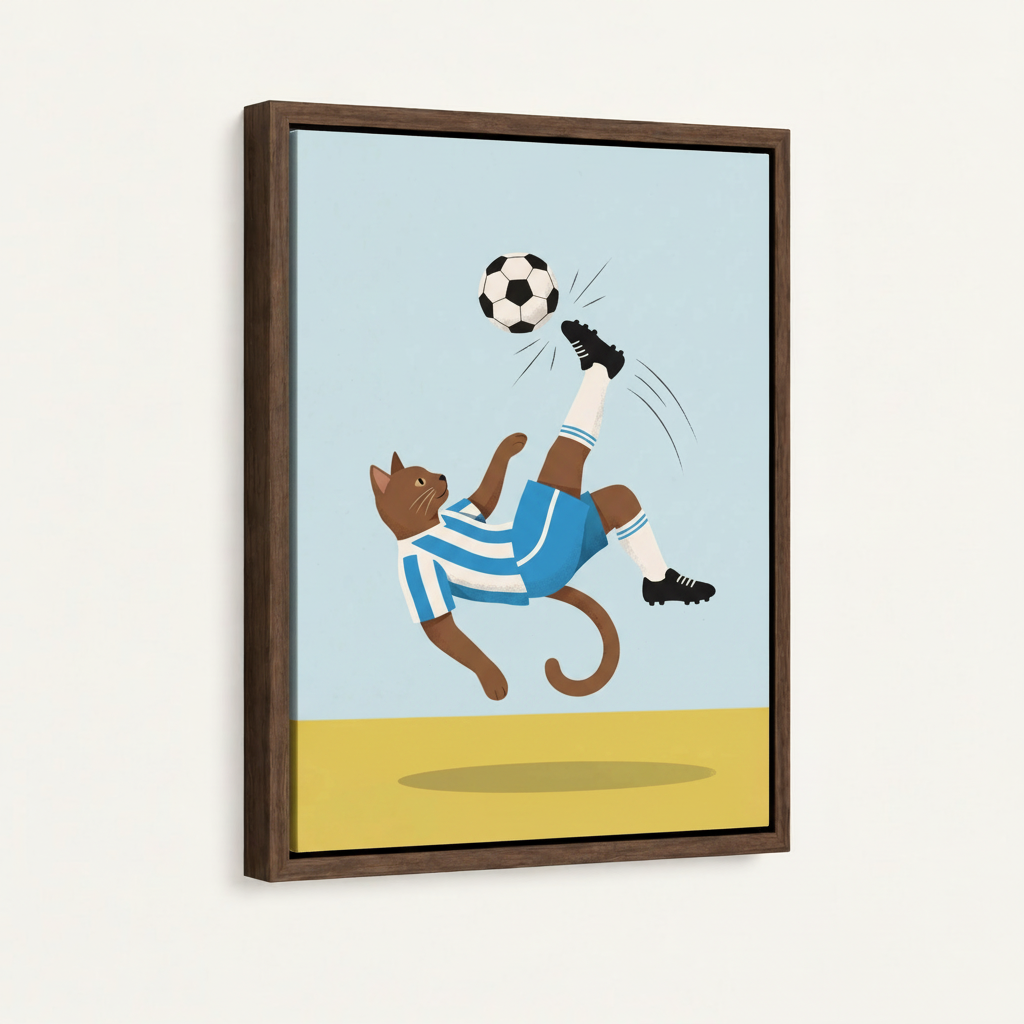 Framed canvas close-up of cat in blue jersey performing a bicycle kick on sky-blue background