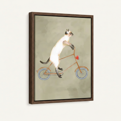 Siamese cat bicycle canvas print in dark walnut float frame shown at left-facing angle on cream background