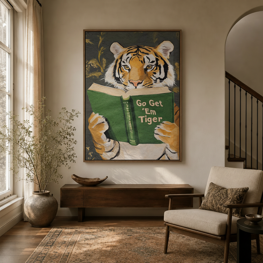 Funny tiger reading book framed canvas wall art styled in a warm modern entryway with neutral tones
