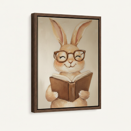 Watercolor bunny with glasses reading canvas art in dark walnut frame with hairline gap, off-white background