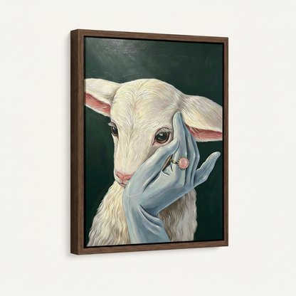 White baby goat with blue hand and pink ring oil painting canvas print in dark walnut floating frame on white background