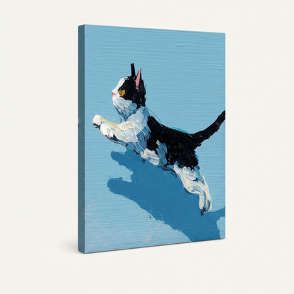 Gallery-wrapped tuxedo cat canvas wall art shown at angle, frameless style on white background