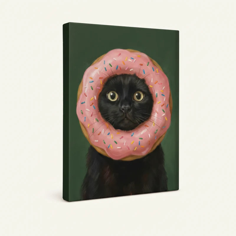 Gallery-wrapped black cat donut canvas art, angled side view showing deep green background and wrap edges