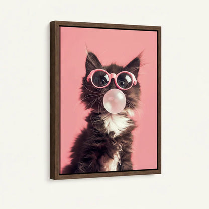 Framed black kitten in pink sunglasses pop art canvas print with walnut frame shown at angle against white wall