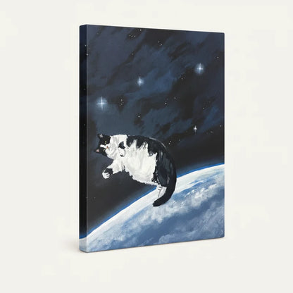 Gallery-wrapped canvas close-up of black and white cat floating weightlessly above the curve of Earth in a starry galaxy