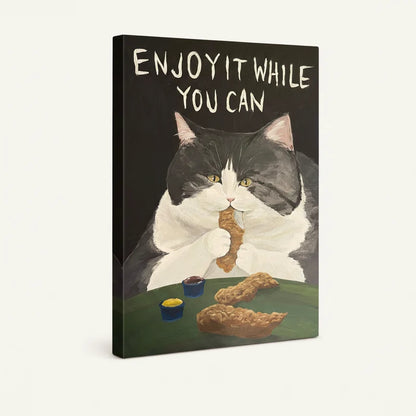 Gallery-wrapped canvas of tuxedo cat holding fried chicken with bold hand-lettered motivational text above