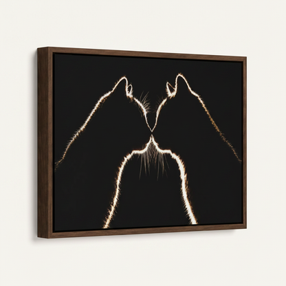 Two cats nose to nose in dark walnut floating frame shown at angle on warm off-white background