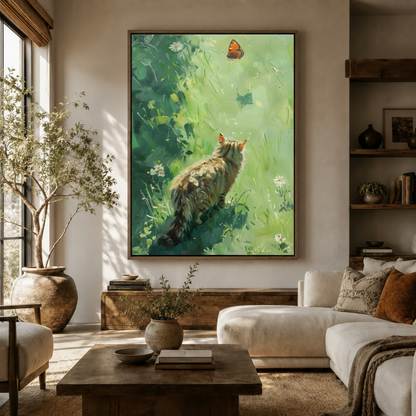 Cat butterfly meadow impressionist canvas wall art above console in bright modern living room with olive tree and white sofa