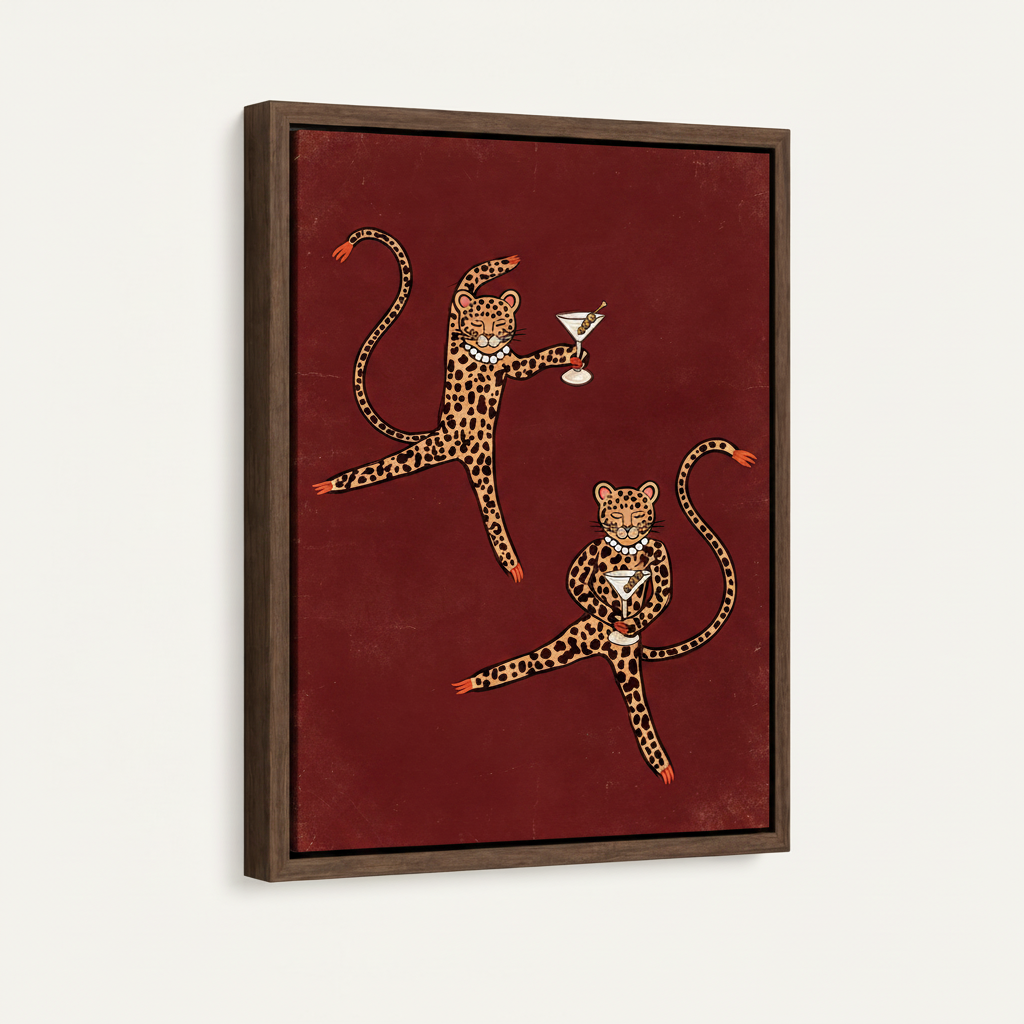 Side-angle view of framed canvas showing two dancing leopards with martinis on a deep burgundy background