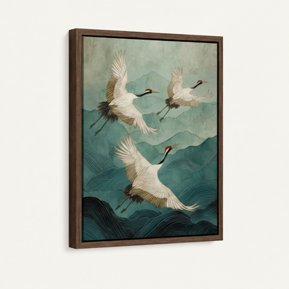 Walnut framed canvas side angle of three white cranes flying over layered teal blue mountain waves on white wall