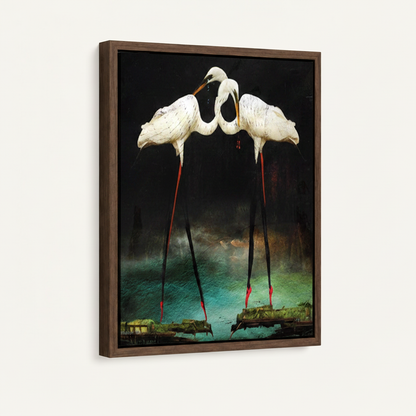 Walnut framed canvas side angle of two white egrets with crimson legs facing each other over glowing teal wetland