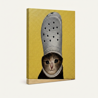 Gallery-wrapped canvas side view of funny cat Croc hat art print showing yellow background wrapping around canvas edges