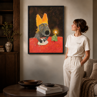 Black-framed holiday dog wall art in white in a warmly furnished living room.